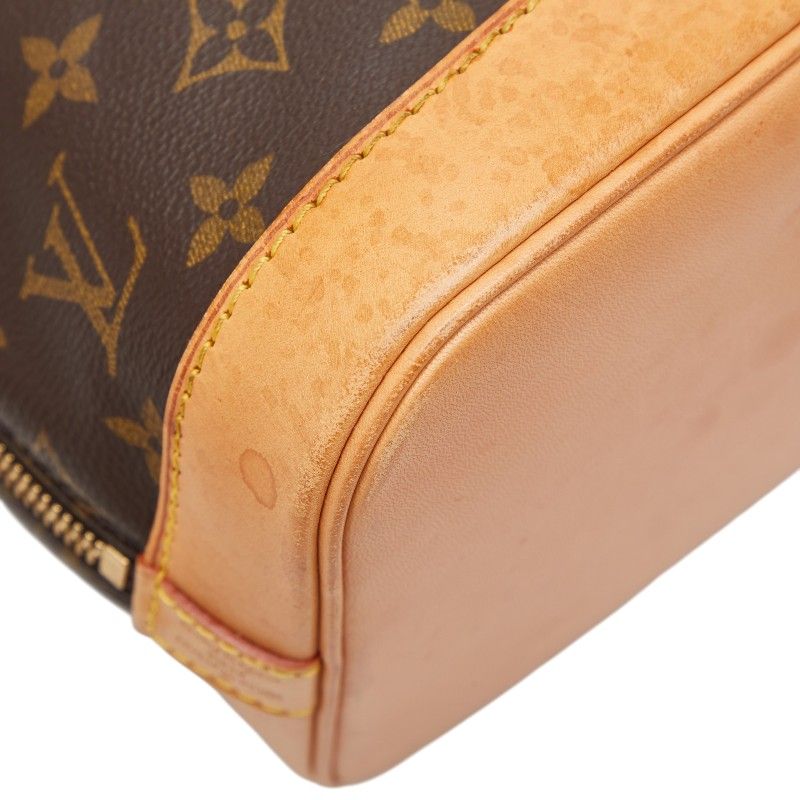 Louis Vuitton Monogram Alma Vintage Handbag — view 9