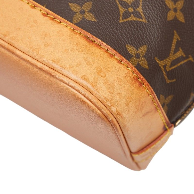 Louis Vuitton Monogram Alma Vintage Handbag — view 6