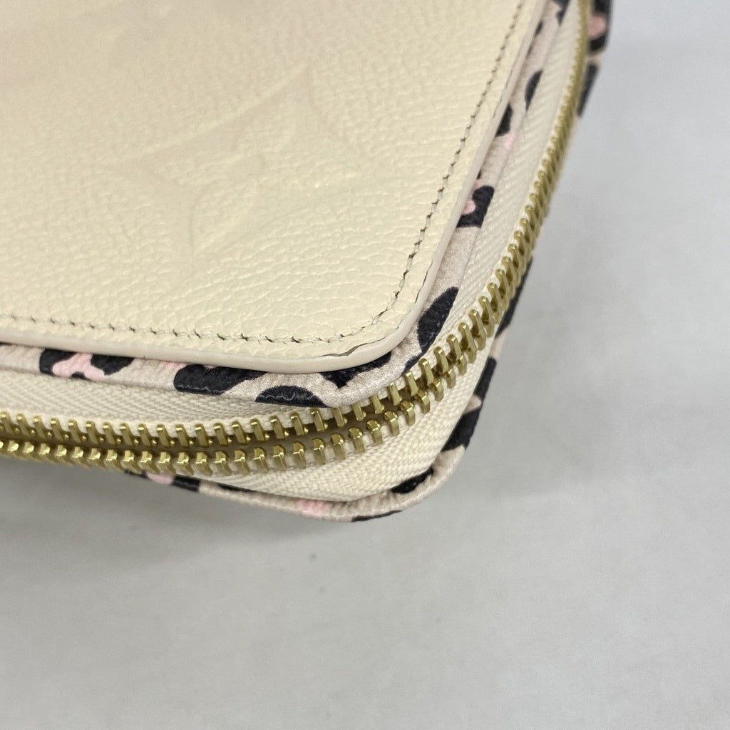 Louis Vuitton Wallet Monogram Empreinte Wild at Heart Zippy Cream — view 7