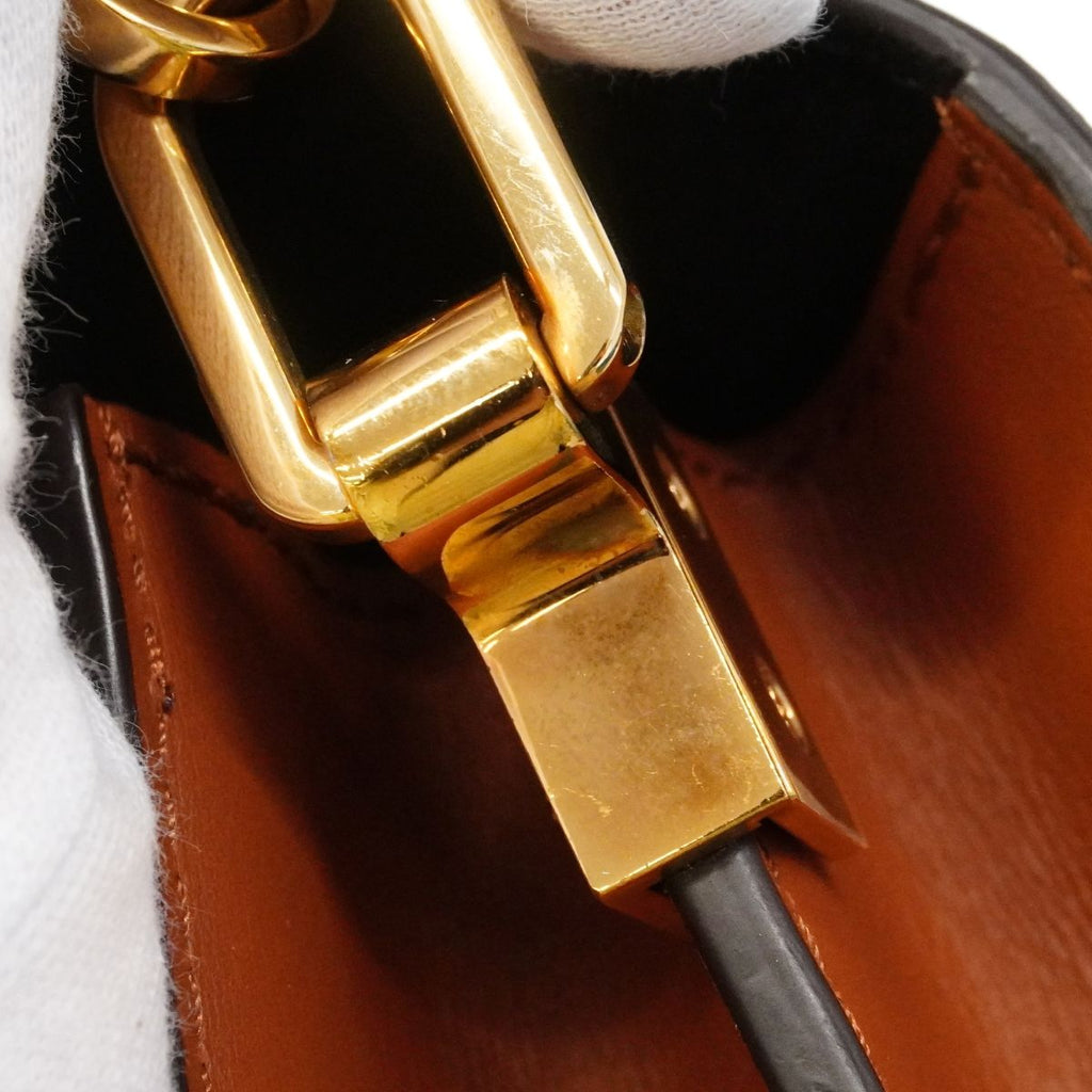 Louis Vuitton Shoulder Bag Monogram Reverse Dauphine Mini Brown — view 8