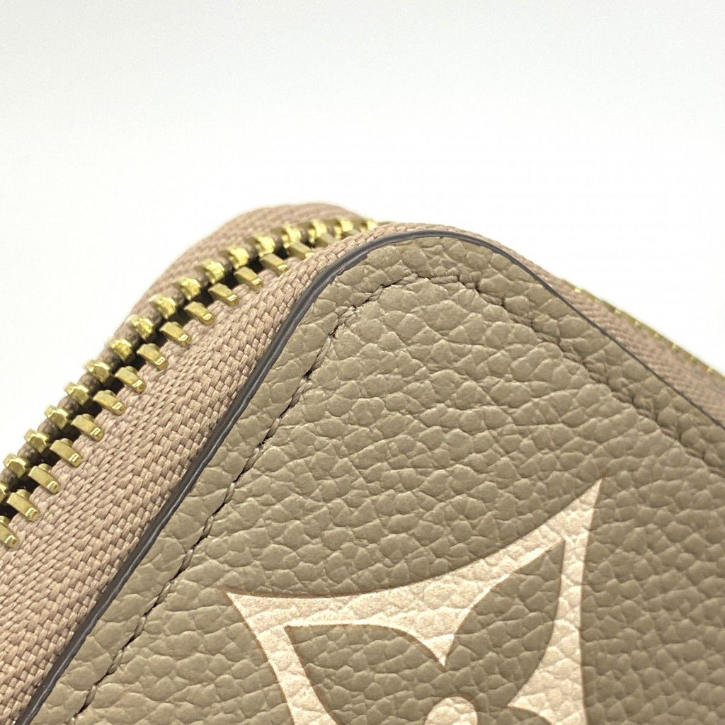 Louis Vuitton Wallet Monogram Empreinte Zippy Tourtelle Cream Bicolor — view 5