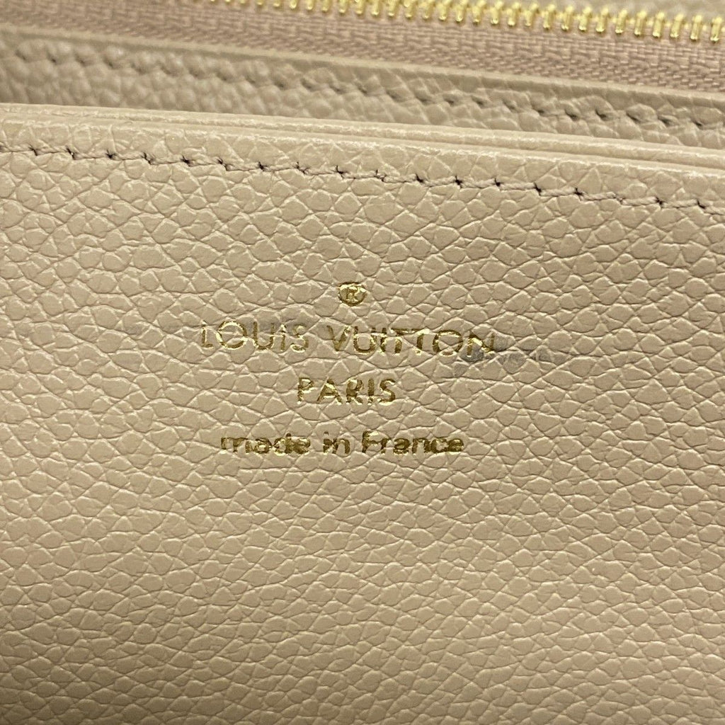 Louis Vuitton Wallet Monogram Empreinte Zippy Tourtelle Cream Bicolor — view 4