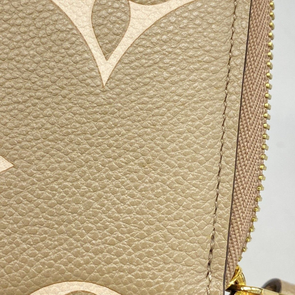 Louis Vuitton Wallet Monogram Empreinte Zippy Tourtelle Cream Bicolor — view 6