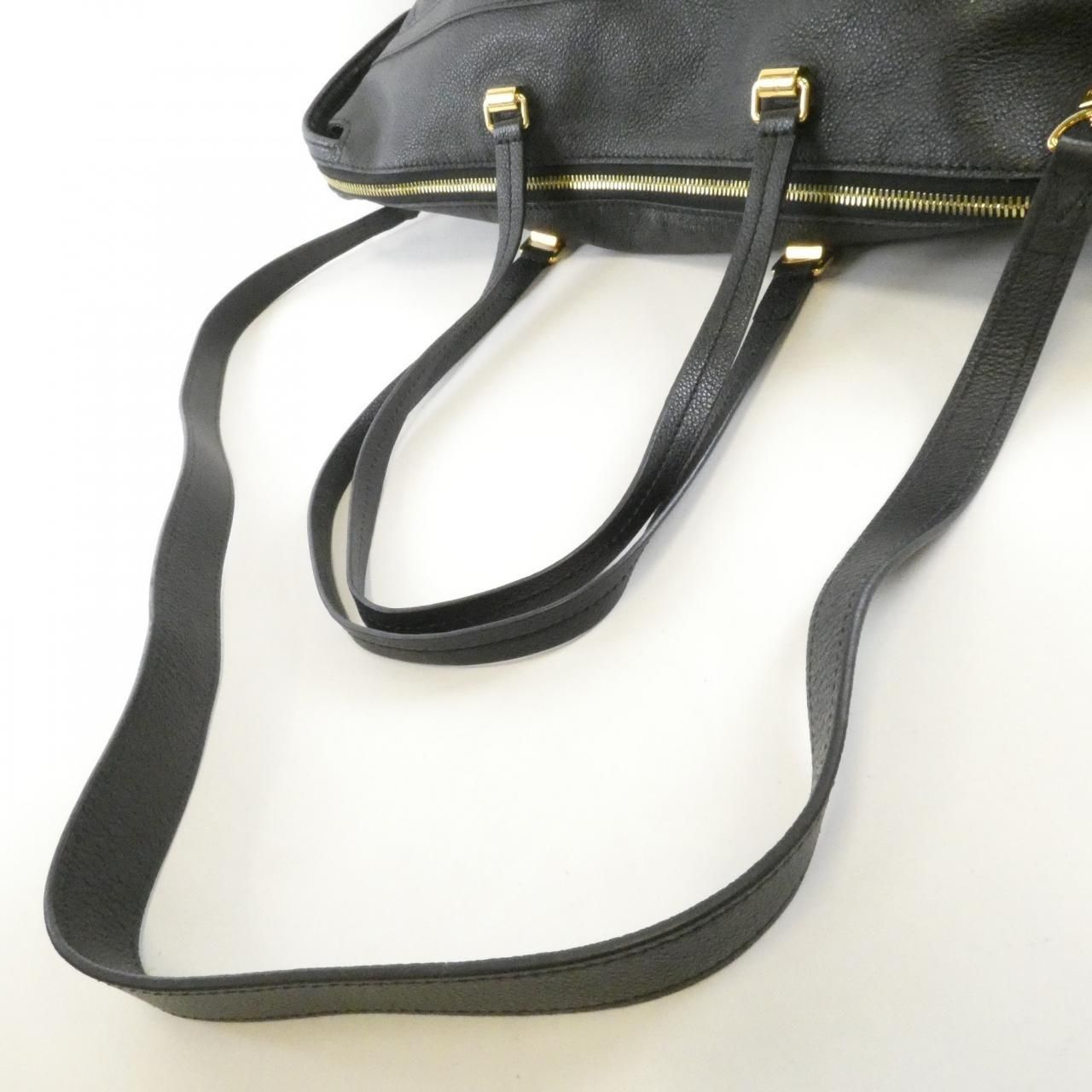 Louis Vuitton Monogram Empreinte Boetie Shoulder — view 9