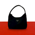 Prada Triangle Logo Plate Tessuto Nylon Mini Handbag Pouch Black