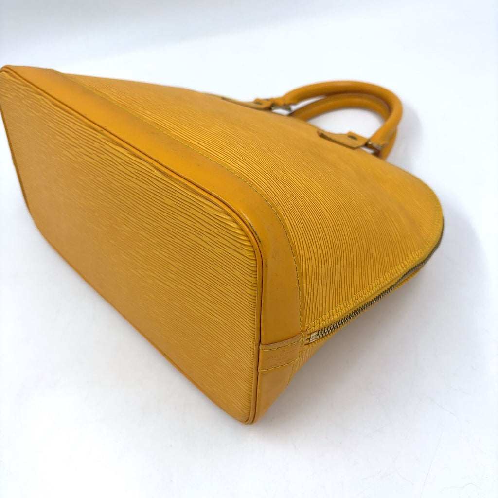 Louis Vuitton Alma Epi Tassili Yellow Leather Handbag Gold — view 9