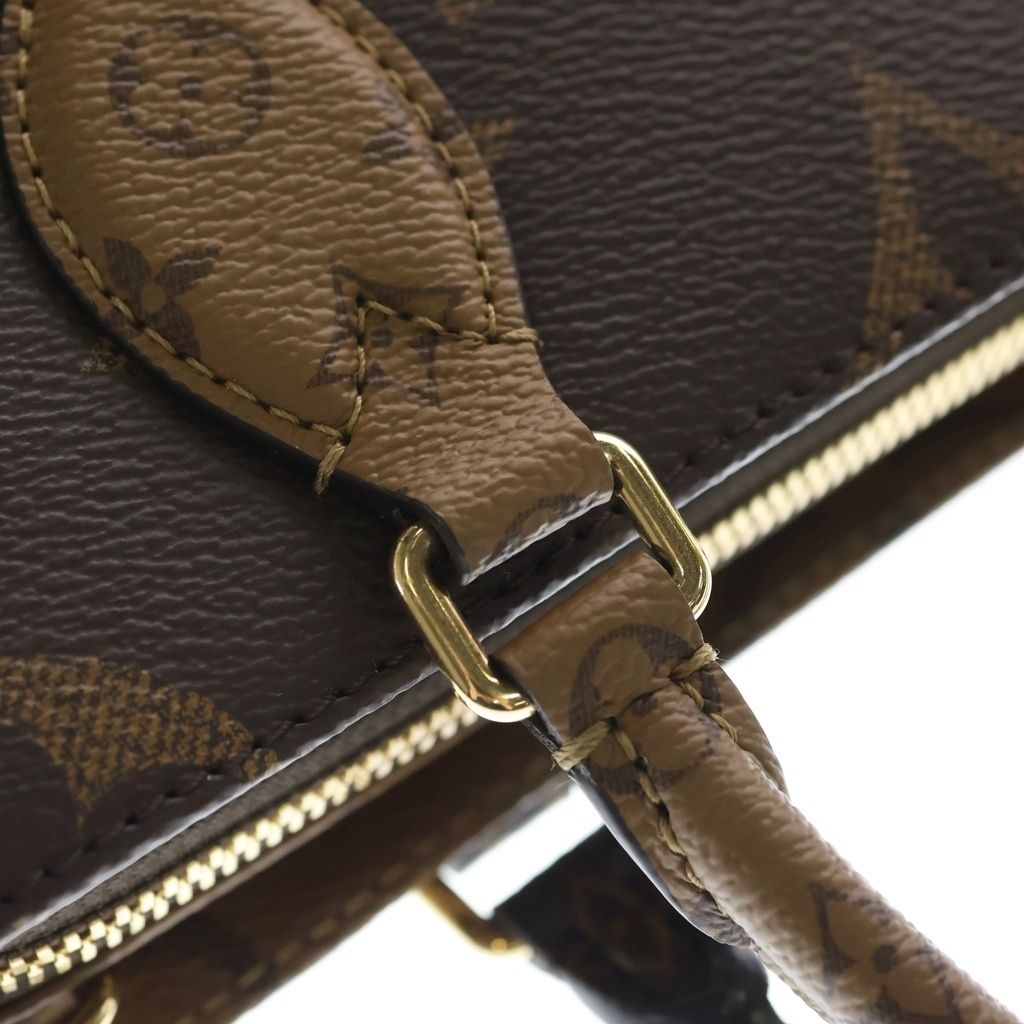 Louis Vuitton Monogram Giant Reverse On The Go East West 2-Way Shoulder — view 6