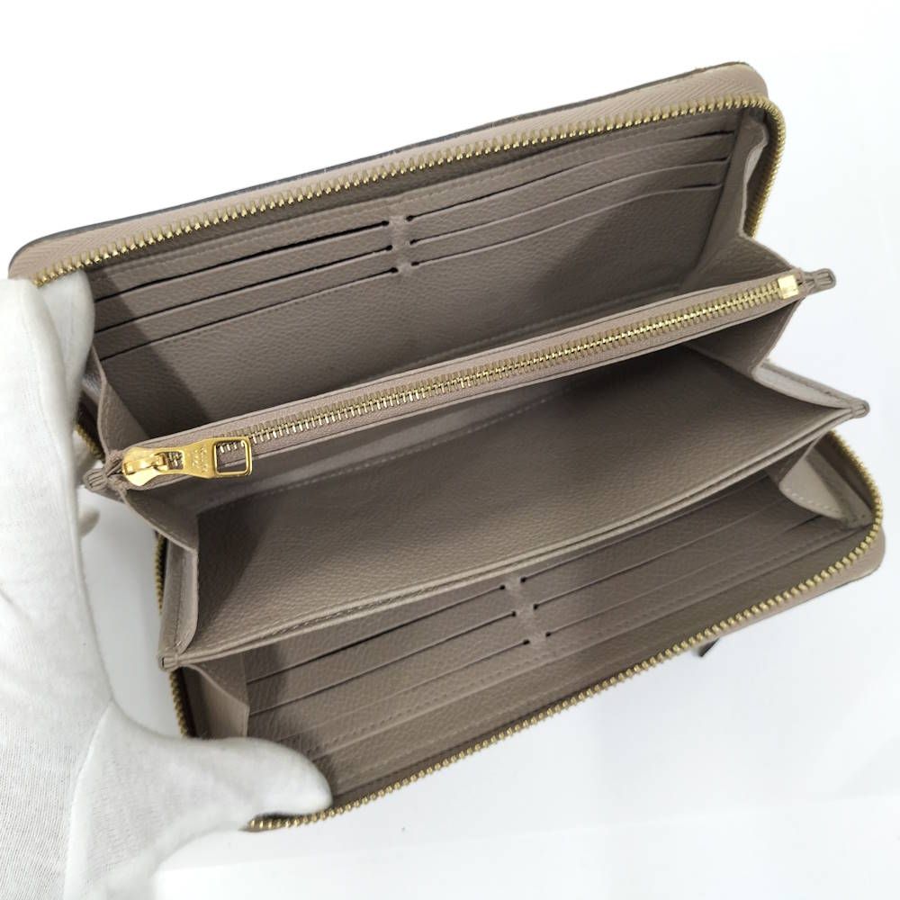 Louis Vuitton Zippy Wallet Monogram Empreinte Tourtreme Cream Beige — view 2