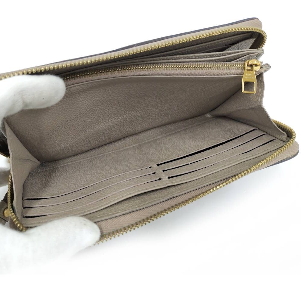 Louis Vuitton Zippy Wallet Monogram Empreinte Tourtreme Cream Beige — view 8