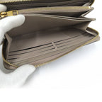 Louis Vuitton Zippy Wallet Monogram Empreinte Tourtreme Cream Beige — view 7
