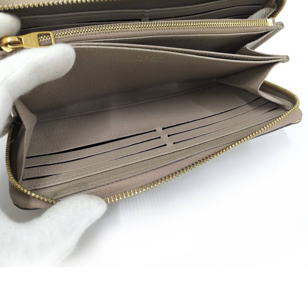 Louis Vuitton Zippy Wallet Monogram Empreinte Tourtreme Cream Beige — view 7