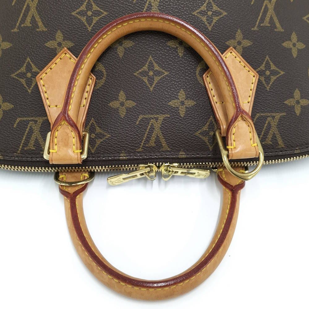 Louis Vuitton Alma Handbag Monogram — view 7