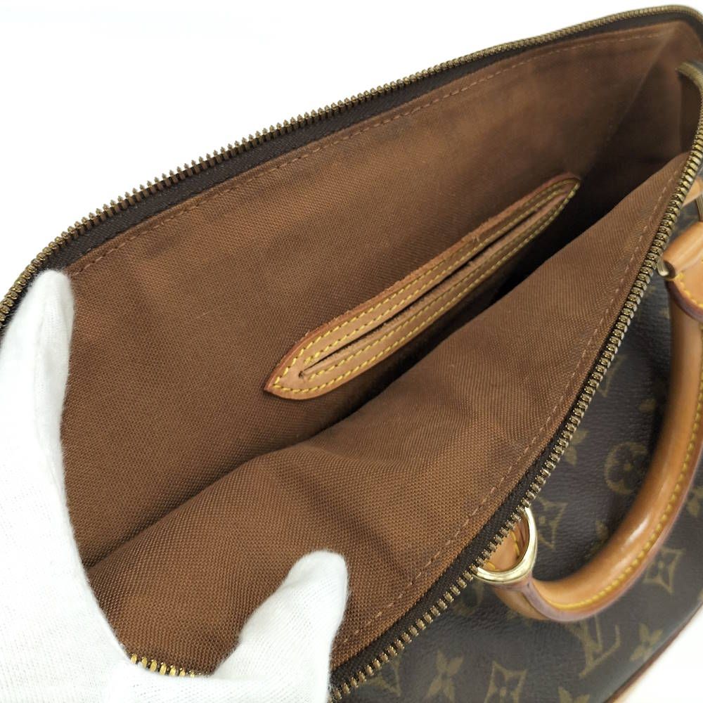 Louis Vuitton Alma Handbag Monogram — view 9
