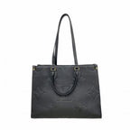 Louis Vuitton Tote Monogram Empreinte On The Go MM Noir 2-Way