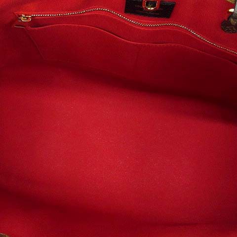 Louis Vuitton Monogram Giant Reverse On The Go GM 2-Way Tote — view 7