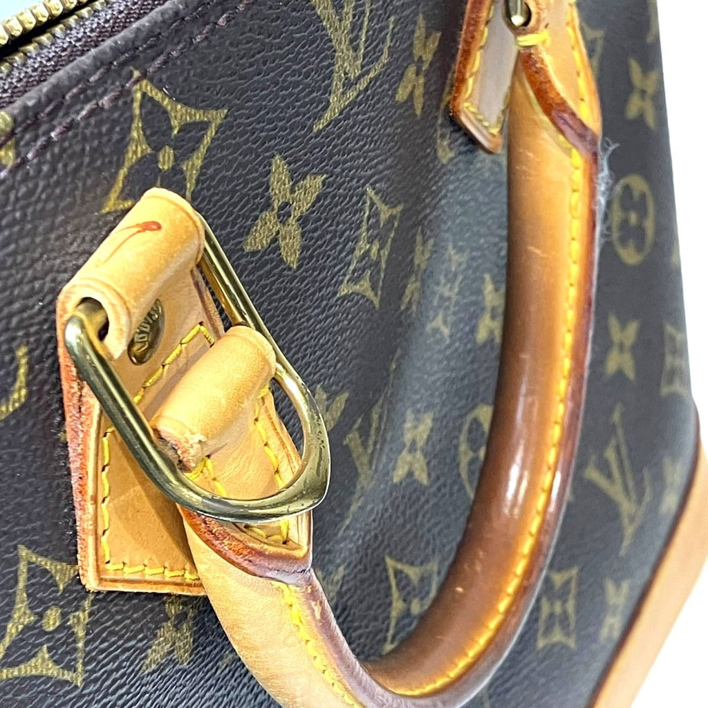 Louis Vuitton Alma Monogram Handbag Canvas — view 9