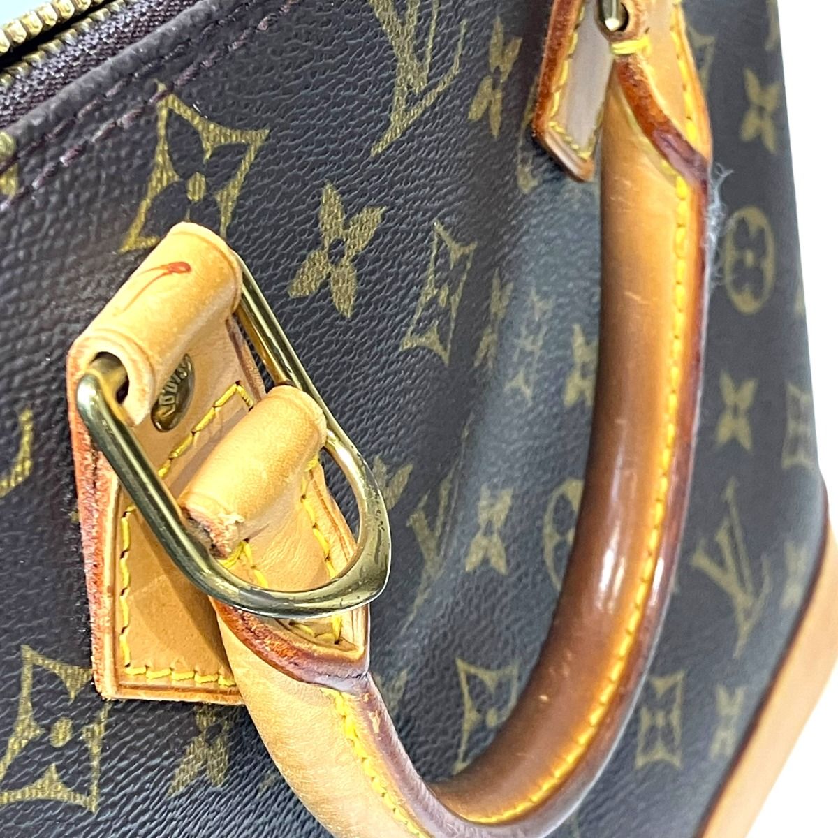 Louis Vuitton Alma Monogram Handbag Canvas — view 9