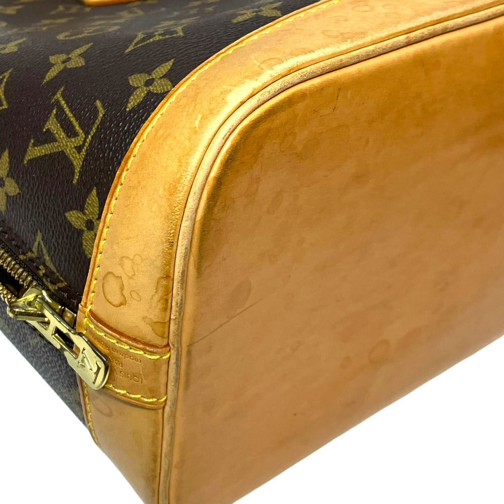 Louis Vuitton Alma Monogram Handbag Canvas — view 8
