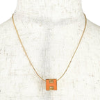 Hermes Cube Metal Orange Gold Necklace — view 3