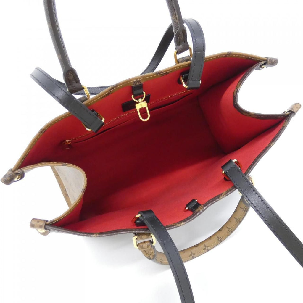 Louis Vuitton Monogram Giant On The Go MM — view 8