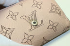 Louis Vuitton Mahina Portefeuille Iris XS Leather Trifold Wallet — view 9
