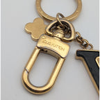 Louis Vuitton Porte Cles Capucines Key Holder Charm Gold Black LV Logo — view 3