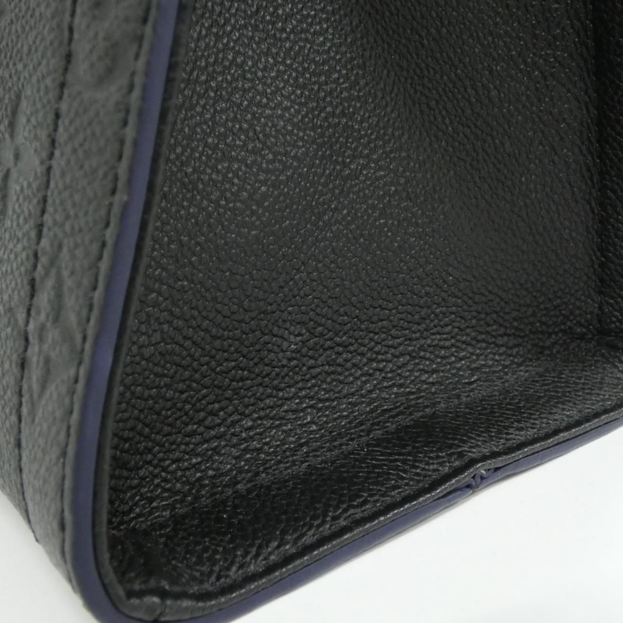 Louis Vuitton Monogram Empreinte Suri MM — view 6