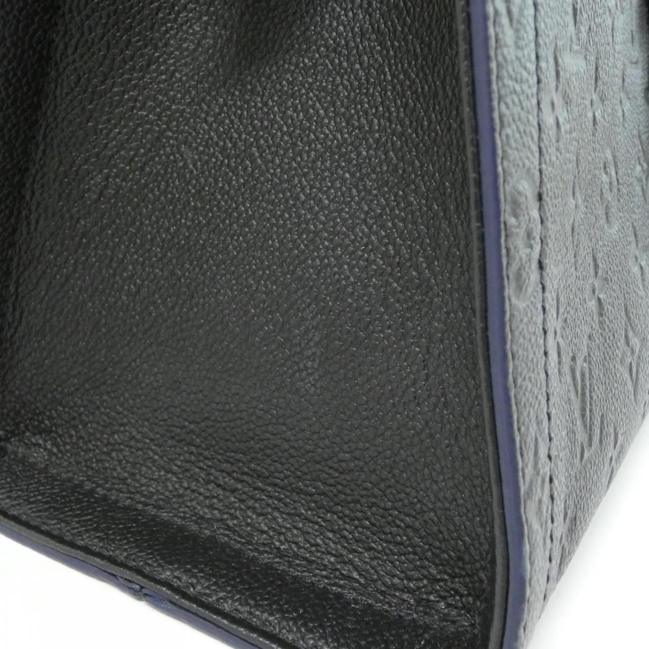 Louis Vuitton Monogram Empreinte Suri MM — view 4