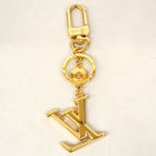 Louis Vuitton Key Holder Charm LV Facet Gold — view 6