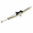 Dior Montaigne 30 Toronto Ribbon Logo Faux Pearl Bracelet Gold — view 4