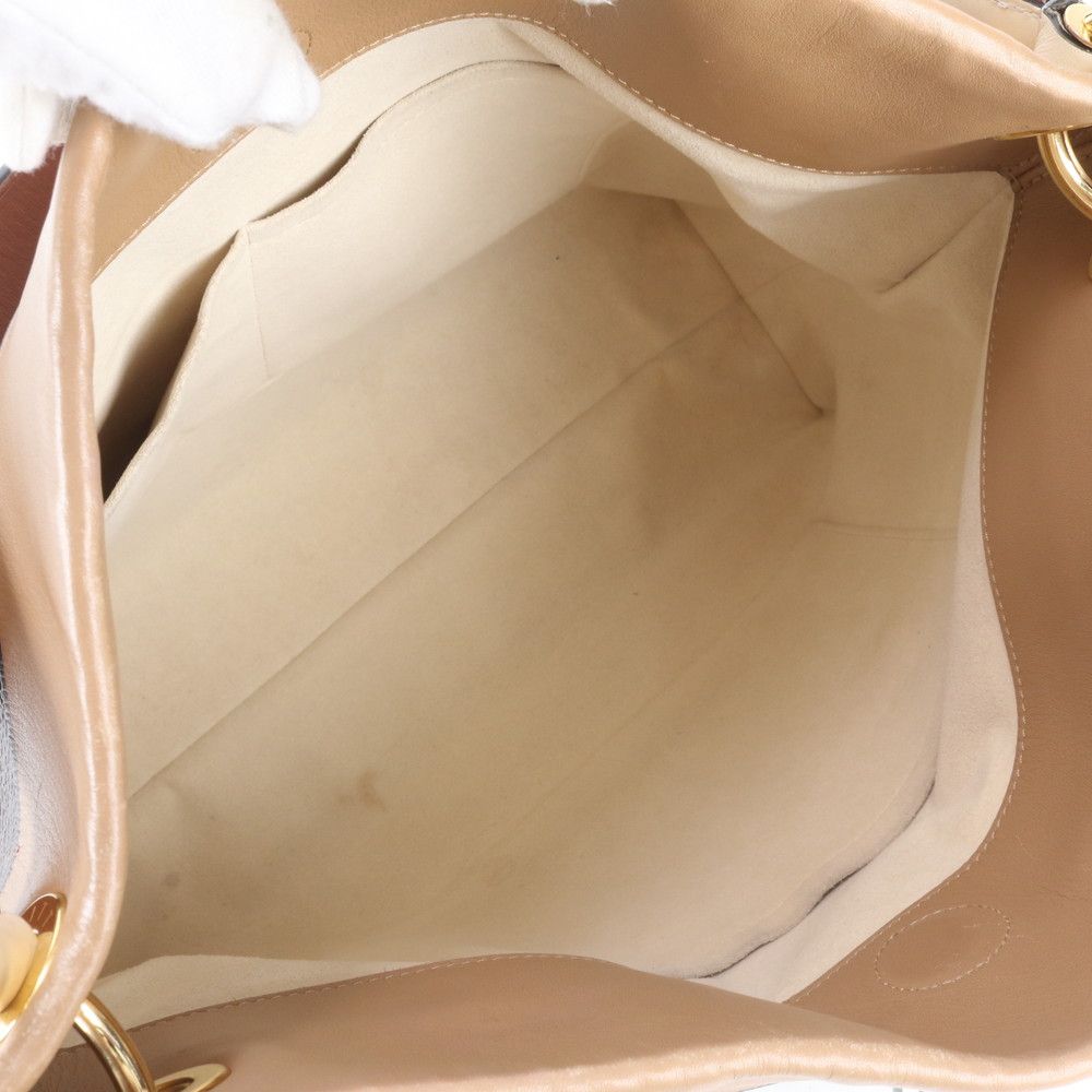 Louis Vuitton Monogram Tui Roulis Besace Leather Shoulder Bag Hand — view 7