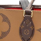 Louis Vuitton Shoulder Bag On The Go GM Monogram Giant Reverse Canvas Leather — view 8
