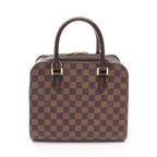 Louis Vuitton Handbag Triana Canvas Leather