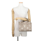 Louis Vuitton Monogram Empreinte On The Go PM Bicolor Tote 2-Way Shoulder — view 5