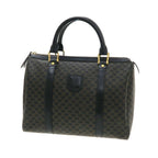 Celine Macadam Travel