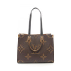 Louis Vuitton Tote On The Go MM Monogram Giant Reverse 2-Way Canvas Leather