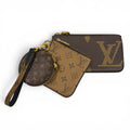 Louis Vuitton Monogram Giant Reverse Leather Pochette Trio Brown