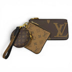 Louis Vuitton Monogram Giant Reverse Leather Pochette Trio Brown