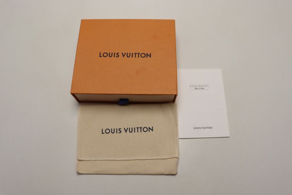 Louis Vuitton Taigarama Discovery Compact Leather Trifold Wallet — view 8