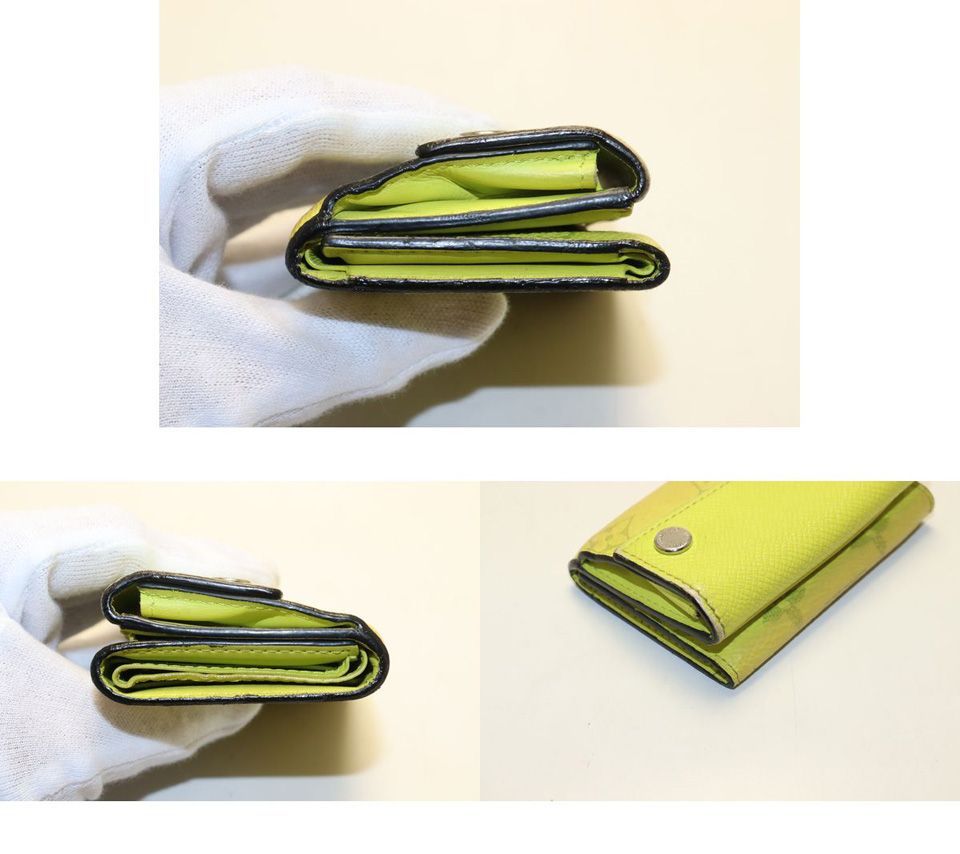 Louis Vuitton Taigarama Discovery Compact Leather Trifold Wallet — view 9