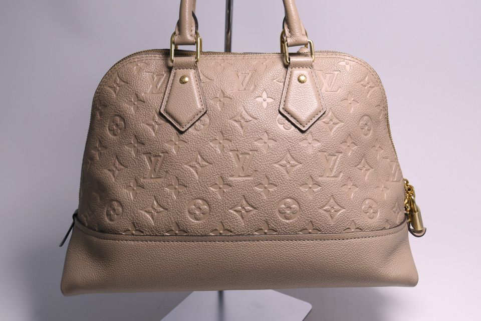 Louis Vuitton Monogram Empreinte Neo Alma PM Leather Handbag — view 2