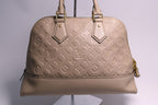 Louis Vuitton Monogram Empreinte Neo Alma PM Leather Handbag — view 2