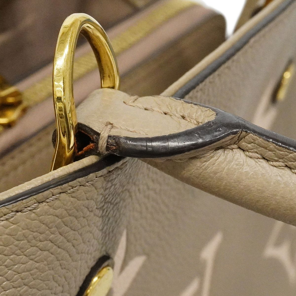 Louis Vuitton Handbag Monogram Empreinte Bicolor Montaigne BB Tourtelle Cream — view 9