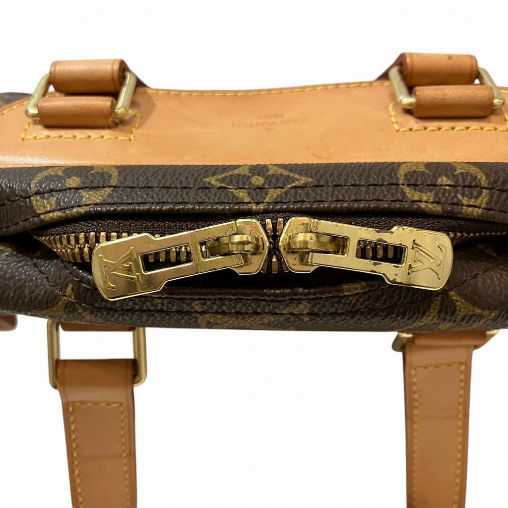 Louis Vuitton Excursion Monogram Leather Handbag — view 8