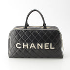 Chanel Quilted Logo Lambskin Boston Bag Black White — view 4