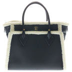 Louis Vuitton on My Side MM Calf Leather Shearling Handbag Black White — view 2