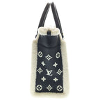 Louis Vuitton on My Side MM Calf Leather Shearling Handbag Black White — view 3