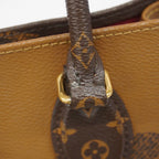 Louis Vuitton Tote Monogram Giant Reverse On The Go MM Brown 2-Way — view 8