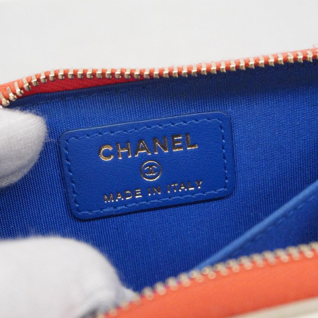 Chanel Coin Case CC Filigree Caviar Leather Blue White Red Gold — view 4