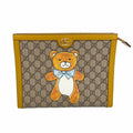 Gucci Clutch GG Supreme Brown Gold